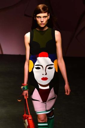 Ahead of the pack: A model sports an art inspired outfit by Prada with football sock leg-warmers.