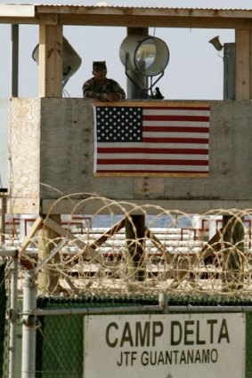 A US soldier stands guard at the maximum security prison Camp Delta at Guantanamo Naval Base.