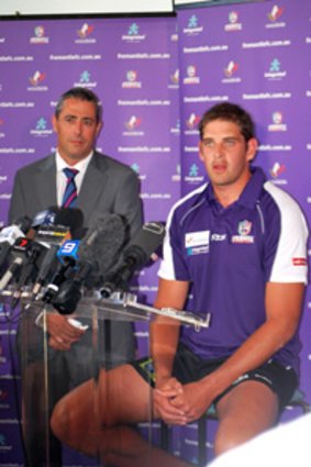 Dockers CEO Steve Rosich and Aaron Sandilands confirming the big man’s new deal.