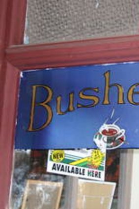 All original: a hand-painted advert for Bushells coffee in a Rushworth shop window.