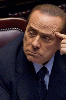 Silvio Berlusconi has defended his former ally, Umberto Bossi.