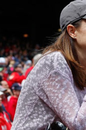 A woman sheds a tear during pre-game ceremonies in honor of the Marathon bombing victims before a game between the Boston Red Sox and the Kansas City Royals at Fenway Park on April 20, 2013 in Boston, Massachusetts.