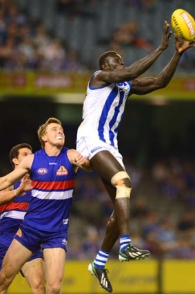 Majak Daw marks during the game against the Bulldogs.