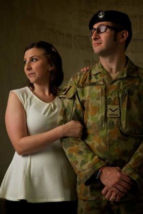 Soldiering on: Lance Corporal Gary Wilson, with wife Renee, spent two months in a coma after a Black Hawk crash in Afghanistan.