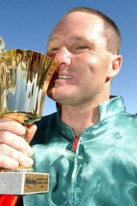 Ray Silburn with the Queanbeyan Cup in 2004.