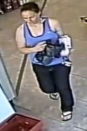 CCTV still from IGA in Applecross of the woman police would like to speak to.