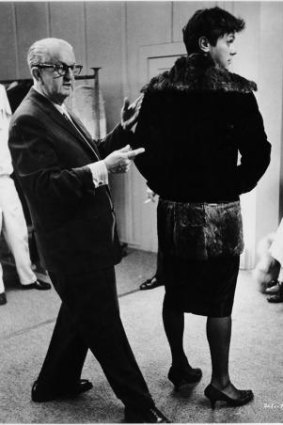 Costume designer Orry Kelly with actor Tony Curtis during the making of the 1959 film Some Like It Hot.
