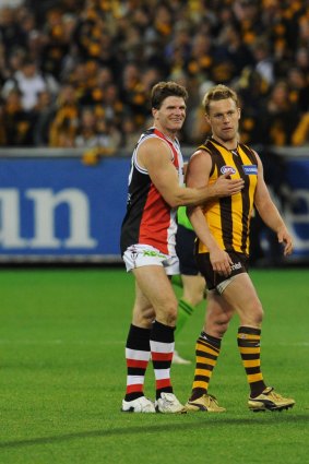 Robert Harvey and Sam Mitchell during the 2008 preliminary final.