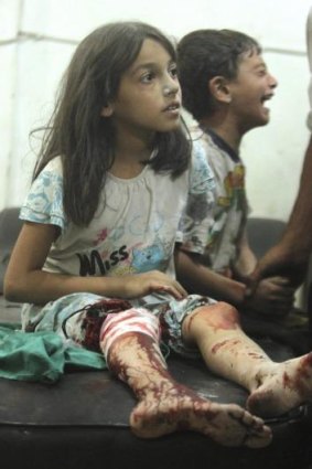 Children injured in a bombardment by Syrian government forces at a field hospital in Douma, near the Syrian capital Damascus, on September 3.