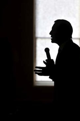 Putting his case: Opposition Leader Tony Abbott speaks at a public meeting in Hamilton, Victoria, during his ''Pollie Pedal'' bike ride.