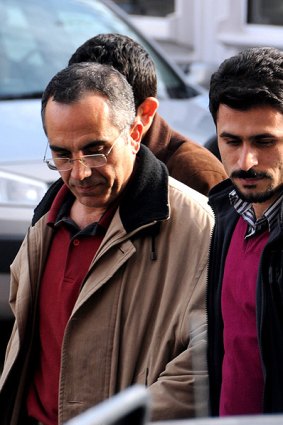 Held ... a former colonel, Ahmet Metin Dikici, is arrested.