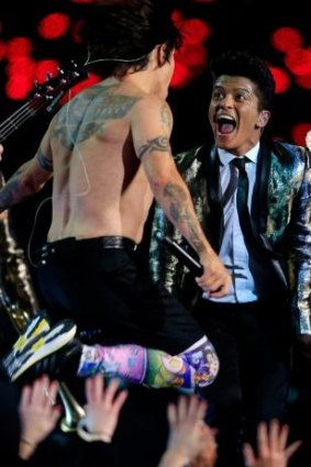 Energisers: Bruno Mars and the Red Hot Chili Peppers' Anthony Kiedis at the 2014 Super Bowl half-time show. 