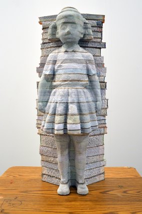 Li Hongbo's schoolgirl sculpted from school books.
