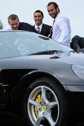 Sports cars for sports stars ... Manly players yesterday.