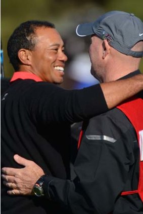 That's seven wins at Torrey ... Tiger Woods celebrates his victory with caddie Joe LaCava.
