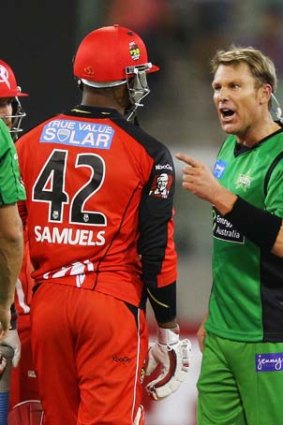 All fired up ... Shane Warne and Marlon Samuels.