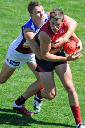 Daniel Nicholson playing for Melbourne in a pre-season game this February.
