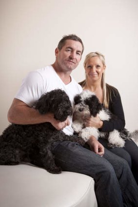 Second chance … Daryn Cresswell with his second wife, Joanne, and their dogs BJ and Geordie at their Coolangatta home.