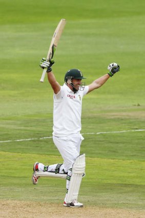 A.B. de Villiers celebrates reaching his century on day two of the second Test against Australia.