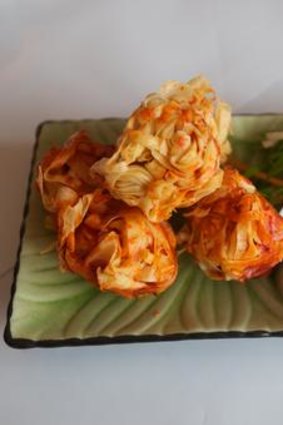 Deep-fried thread paneer combines cheese with spiced noodles.