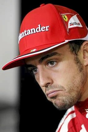 Not happy ... Alonso at the post-race media conference.