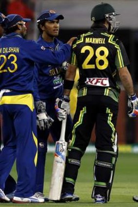Playing hard: Glenn Maxwell and Mahela Jayawardene at the conclusion of Monday night’s game.