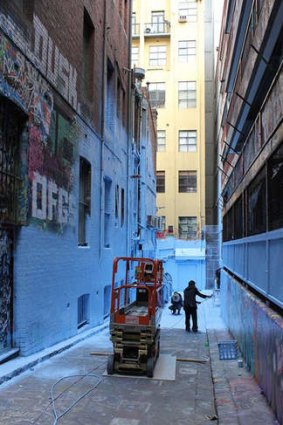 The laneway being painted.