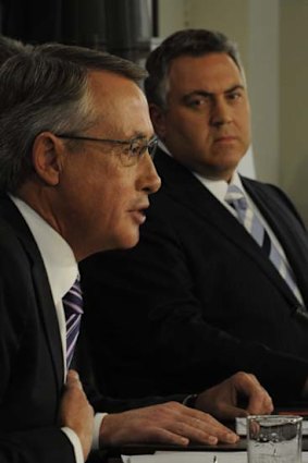 Wayne Swan and Joe Hockey at the National Press Club yesterday.