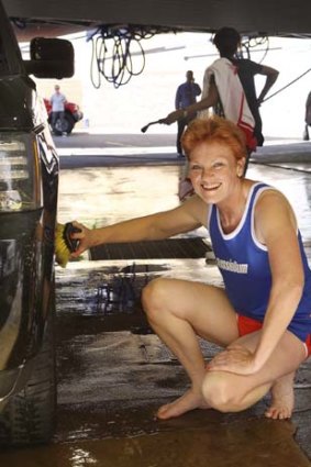 Risky business ... Pauline Hanson in the car wash challenge.