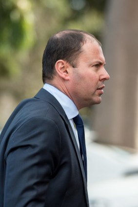 Federal MP Josh Frydenberg arriving at the funeral for Lady Renouf.