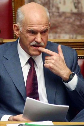 Greek Prime Minister George Papandreou in parliament  during a session to vote for the austerity plan demanded by international creditors.
