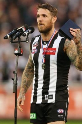 Dane Swan accepts the Anzac Medal for his performance against Essendon.