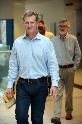 Wallabies great Michael Lynagh (left) and his father Ian at the Royal Brisbane hospital yesterday.