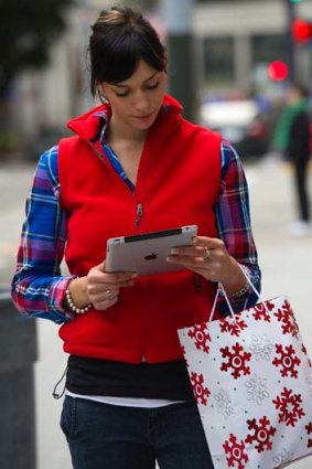 Out-smarted &#8230; the ease and flexibility of popular hands-on tablets like the iPad has shoppers bewitched in the US.