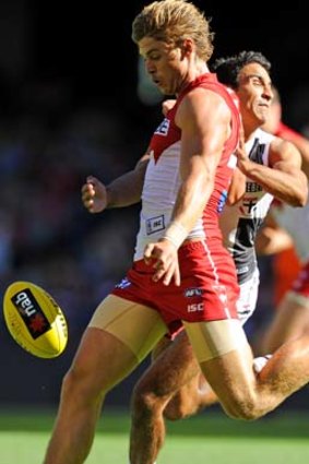 Sydney's Dane Rampe is tackled by St Kilda's Trent Dennis-Lane during the NAB Cup.