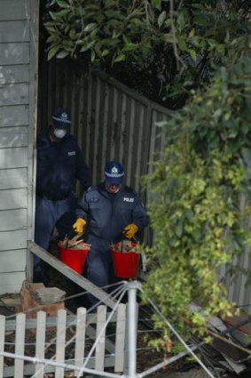 Grim findings … police search a house in Sydney's Gladesville for Tegan's remains.