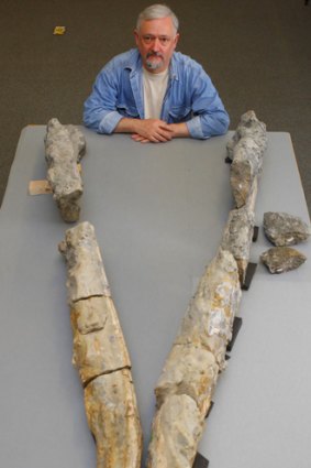 Palaeontologist Richard Forrest with the jaw bone of a pliosaur.