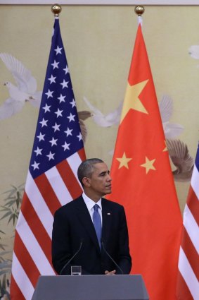 US President Barack Obama (left) and Chinese President Xi Jinping attend a press conference at the Great Hall of People in Beijing in 2014. Photo: Getty Images