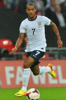 Sidelined: England midfielder Theo Walcott.
