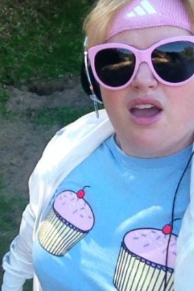 Rebel Wilson models one of her Fat Mandi T-shirts while out walking.