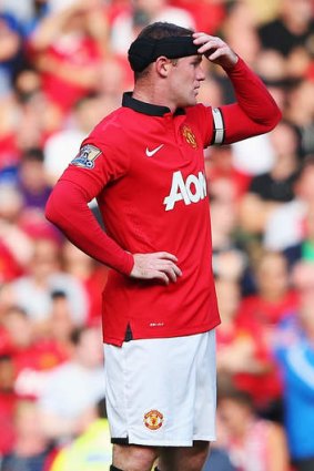 Sunnier climes: Manchester United's Wayne Rooney.