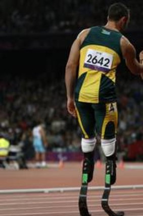 "Not a fair race" ... Alan Oliveira (R) is congratulated by South Africa's Oscar Pistorius.