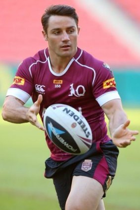 Rushed back: Cooper Cronk's early return from a broken arm underlines the importance Queensland are placing on this dead rubber.