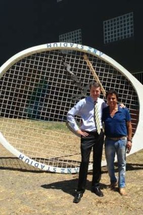 Brisbane Lord Mayor Graham Quirk hits up Stefan for the giant tennis racket that once featured at the old Milton Tennis Centre.
