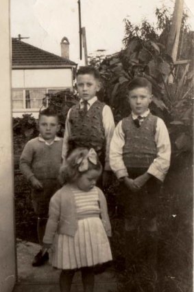 Michael Kirby, left, with his siblings.