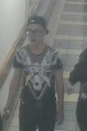 Police want to speak to this man, left, seen leaving the mall with a woman.