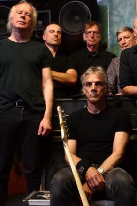 On tour: Radio Birdman with Deniz Tek, seated, and (from left) Rob Younger, Nick Rieth, Jim Dickson, Pip Hoyle and Dave Kettley.