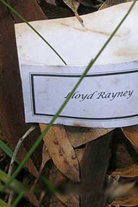 Lloyd Rayney's place card found near the bush grave where his wife's body was discovered.