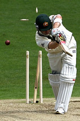 Australia's Michael Clarke is bowled by Umar Gul early in the second Test.