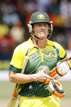 Brad Haddin leaves the pitch after losing his wicket.